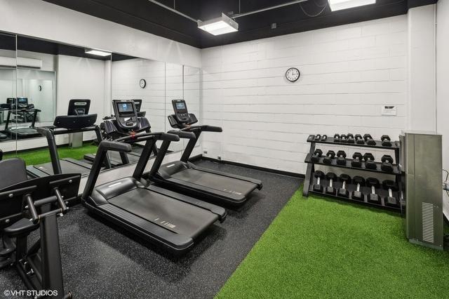 3550 N Lake Shore Dr Unit 1901, Chicago, IL 60657 - workout area featuring an AC wall unit