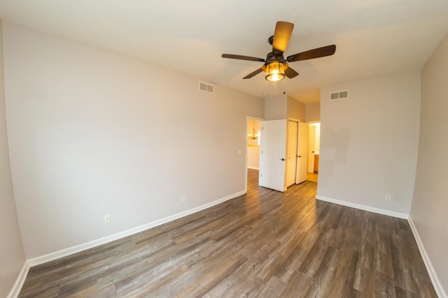 2433 River Oaks Ln Unit 6, Rockford, IL 61102 - unfurnished room featuring dark wood finished floors, baseboards, and ceiling fan