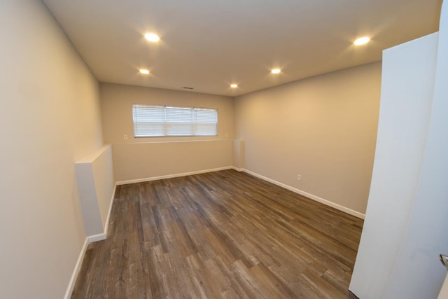 2433 River Oaks Ln Unit 6, Rockford, IL 61102 - spare room with baseboards, dark wood finished floors, and recessed lighting