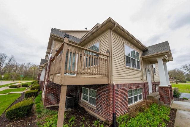 2433 River Oaks Ln Unit 6, Rockford, IL 61102 - view of side of home with brick siding