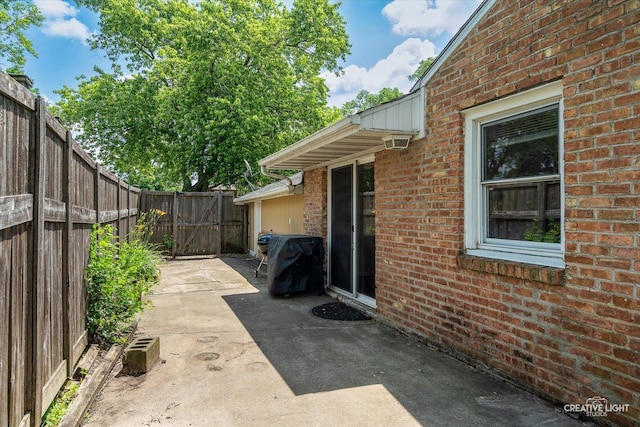 125 S Pinecrest Rd, Bolingbrook, IL 60440 - fenced backyard with a patio and a grill