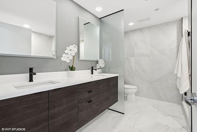130 N Garland Ct Unit 2009, Chicago, IL 60602 - bathroom with toilet, marble finish floors, double vanity, and recessed lighting
