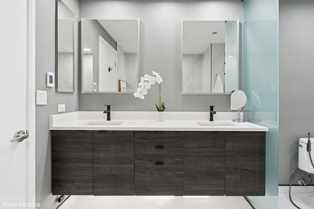 130 N Garland Ct Unit 2009, Chicago, IL 60602 - bathroom with double vanity and toilet