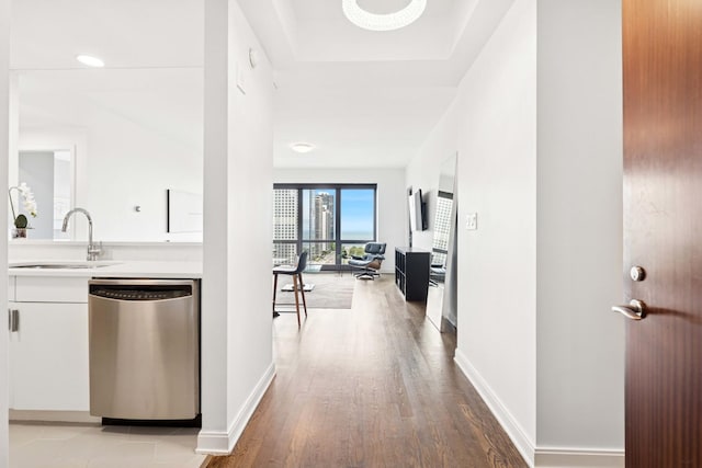 130 N Garland Ct Unit 2009, Chicago, IL 60602 - corridor with a sink, wood finished floors, and baseboards