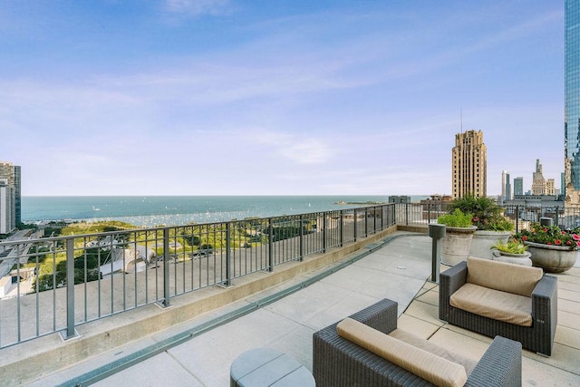 130 N Garland Ct Unit 2009, Chicago, IL 60602 - view of patio / terrace with a balcony, a water view, and a city view