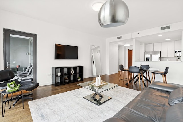 130 N Garland Ct Unit 2009, Chicago, IL 60602 - living room featuring wood finished floors and baseboards