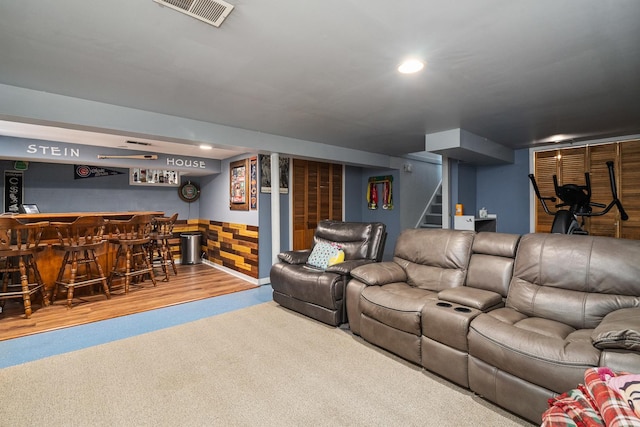 1211 Schriber Ave, Joliet, IL 60435 - carpeted living area with a dry bar, stairs, and recessed lighting