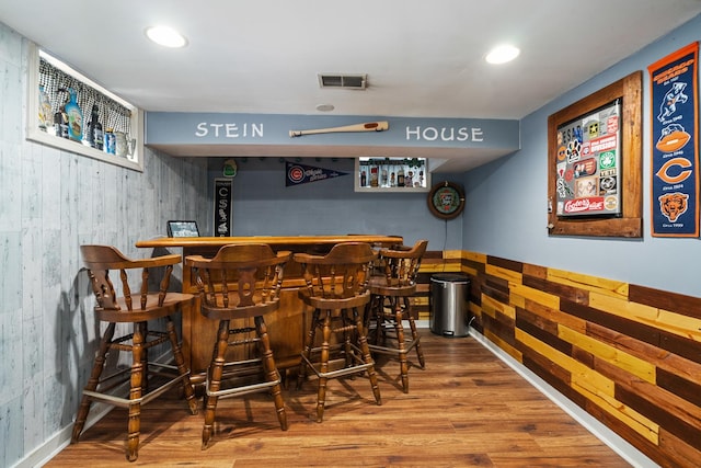 1211 Schriber Ave, Joliet, IL 60435 - indoor dry bar featuring wooden walls, wood finished floors, and recessed lighting