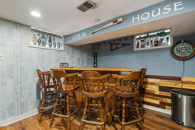 1211 Schriber Ave, Joliet, IL 60435 - indoor dry bar with wood walls and wood finished floors
