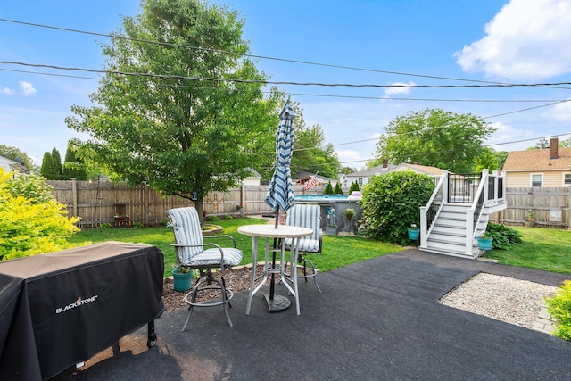 1211 Schriber Ave, Joliet, IL 60435 - fenced backyard featuring stairway and a patio