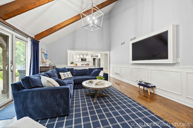 112 Danada Dr, Wheaton, IL 60189 - living area featuring a chandelier, wood finished floors, beamed ceiling, high vaulted ceiling, and wainscoting