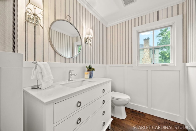 112 Danada Dr, Wheaton, IL 60189 - bathroom featuring wallpapered walls, vanity, wood finished floors, toilet, and ornamental molding