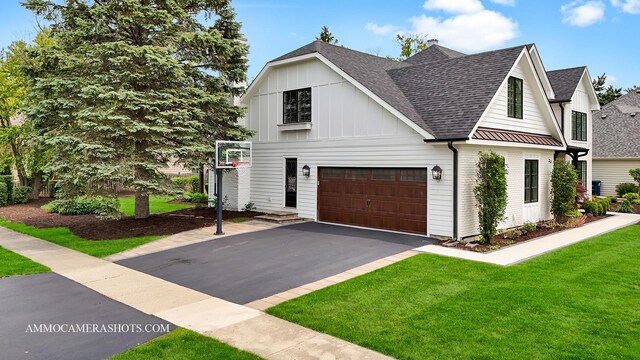112 Danada Dr, Wheaton, IL 60189 - modern farmhouse style home with a shingled roof, driveway, a front lawn, board and batten siding, and a standing seam roof