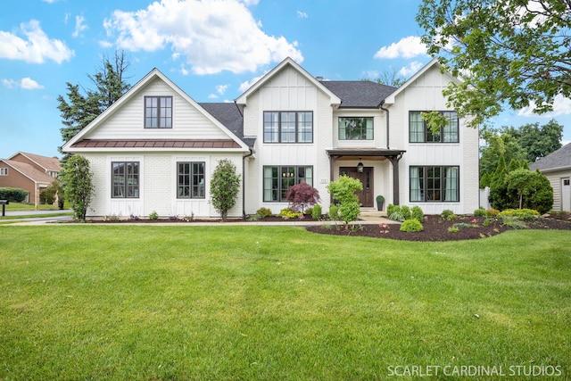 112 Danada Dr, Wheaton, IL 60189 - modern inspired farmhouse featuring board and batten siding, a standing seam roof, and a front lawn