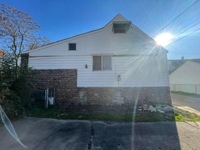 4932 S Laramie Ave, Chicago, IL 60638 - view of property exterior featuring stone siding