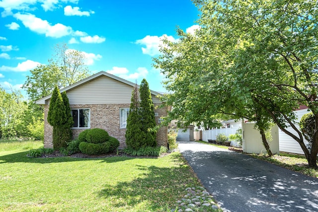 14247 Davis Ct, Blue Island, IL 60406 - view of front of house with brick siding and asphalt driveway