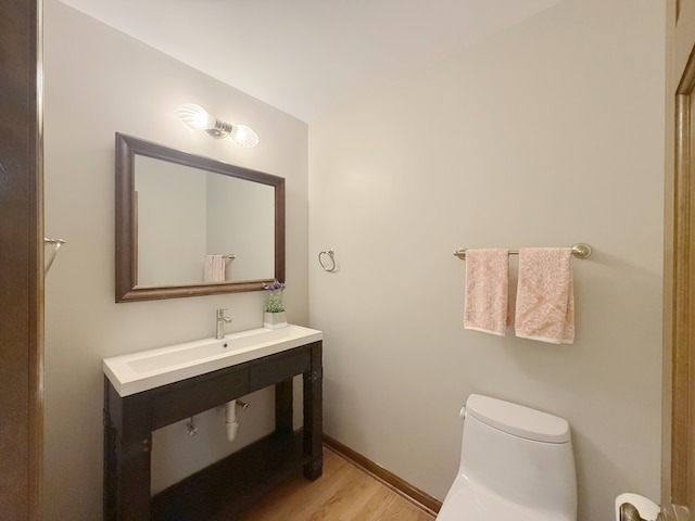 1463 Lantern Cir, Naperville, IL 60540 - bathroom featuring toilet, wood finished floors, and a sink