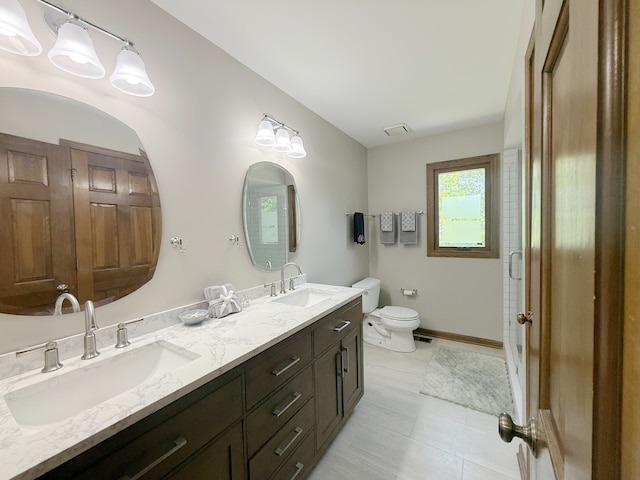 1463 Lantern Cir, Naperville, IL 60540 - full bath with toilet, double vanity, and baseboards