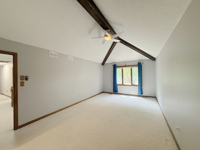 1463 Lantern Cir, Naperville, IL 60540 - spare room featuring light carpet, a textured ceiling, a ceiling fan, and baseboards