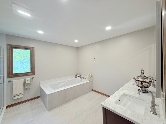 1463 Lantern Cir, Naperville, IL 60540 - full bath featuring double vanity, a bath, baseboards, and recessed lighting