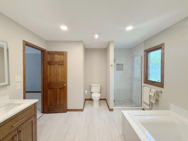 1463 Lantern Cir, Naperville, IL 60540 - bathroom with a shower stall, vanity, a garden tub, toilet, and recessed lighting