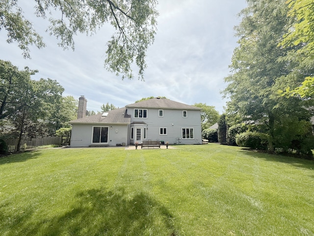 1463 Lantern Cir, Naperville, IL 60540 - rear view of house with a chimney and a patio area
