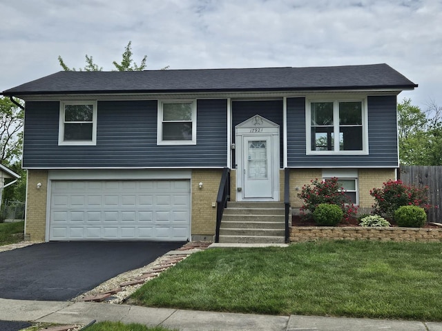 17921 Normandy Ln, Hazel Crest, IL 60429 - bi-level home with brick siding, a garage, and asphalt driveway