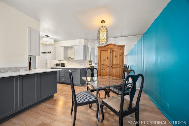 40 N Tower Rd Unit 5B, Oak Brook, IL 60523 - dining space featuring light wood-type flooring