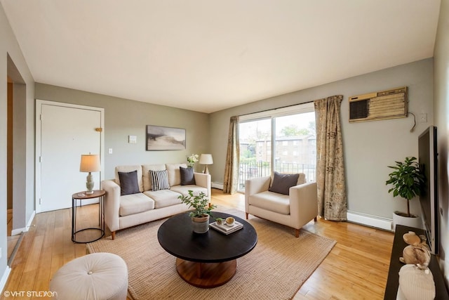 1315 N Baldwin Ct Unit 2C, Palatine, IL 60074 - living room featuring a baseboard radiator, light wood-style flooring, an AC wall unit, and baseboards