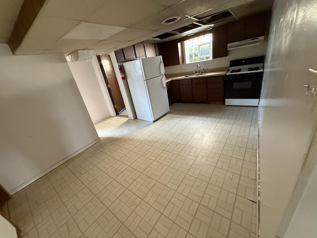 1235 S Mannheim Rd, Westchester, IL 60154 - kitchen featuring stove, freestanding refrigerator, ventilation hood, brick patterned flooring, and a sink