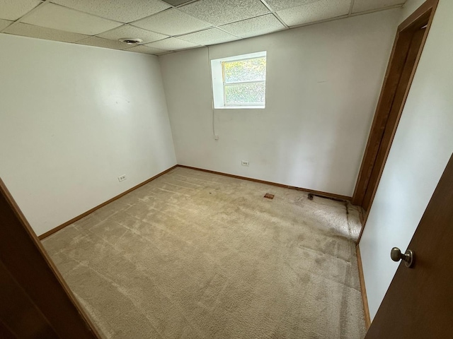 1235 S Mannheim Rd, Westchester, IL 60154 - spare room featuring a paneled ceiling, light carpet, and baseboards