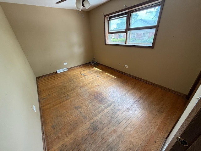 1235 S Mannheim Rd, Westchester, IL 60154 - empty room with ceiling fan, hardwood / wood-style flooring, and baseboards