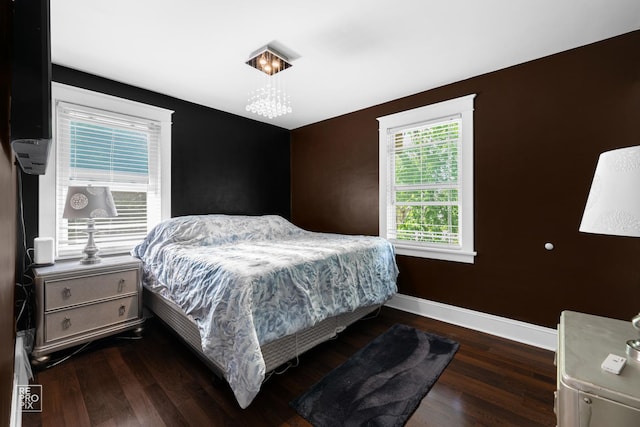 712 Lebanon St, Aurora, IL 60505 - bedroom with dark wood finished floors and baseboards