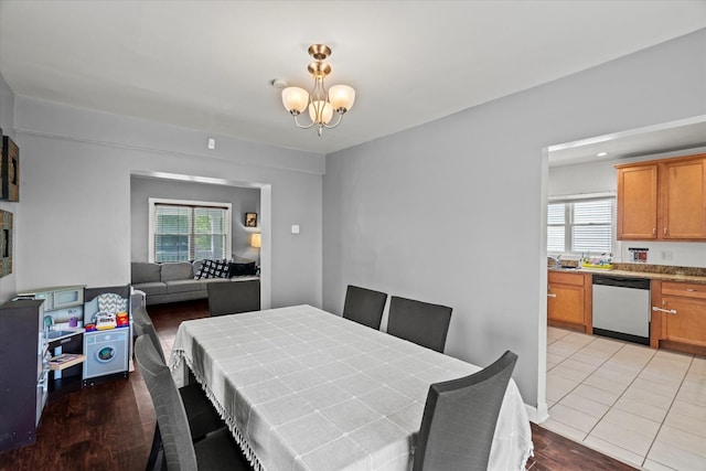 501 N 2nd Ave, Maywood, IL 60153 - dining room featuring a chandelier and light wood-type flooring