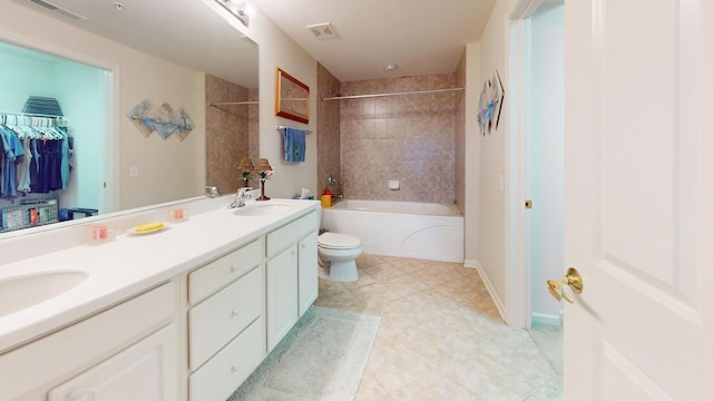 701 W Rand Rd Unit 227, Arlington Heights, IL 60004 - full bathroom featuring double vanity, washtub / shower combination, toilet, and tile patterned floors