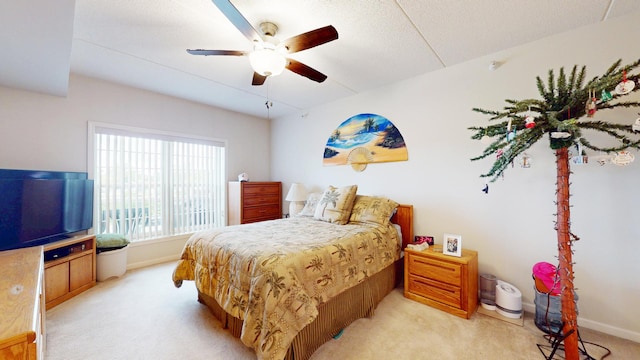 701 W Rand Rd Unit 227, Arlington Heights, IL 60004 - bedroom with light carpet, baseboards, and ceiling fan