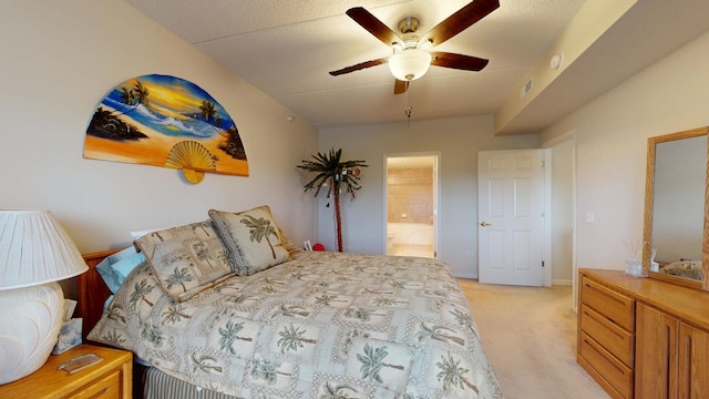 701 W Rand Rd Unit 227, Arlington Heights, IL 60004 - bedroom featuring light colored carpet, ensuite bath, a ceiling fan, and baseboards