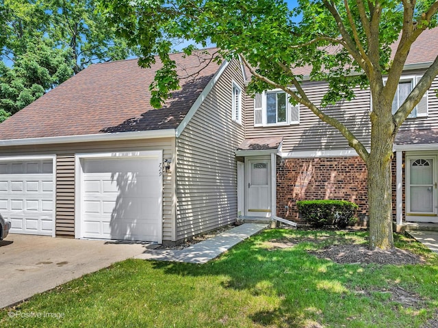 729 Bolton Way, Hanover Park, IL 60133 - view of front of property with a garage, roof with shingles, a front yard, and brick siding