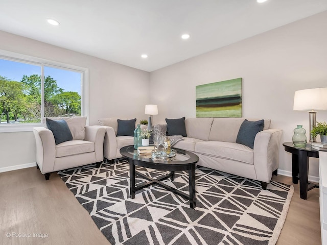 729 Bolton Way, Hanover Park, IL 60133 - living area with wood finished floors, baseboards, and recessed lighting