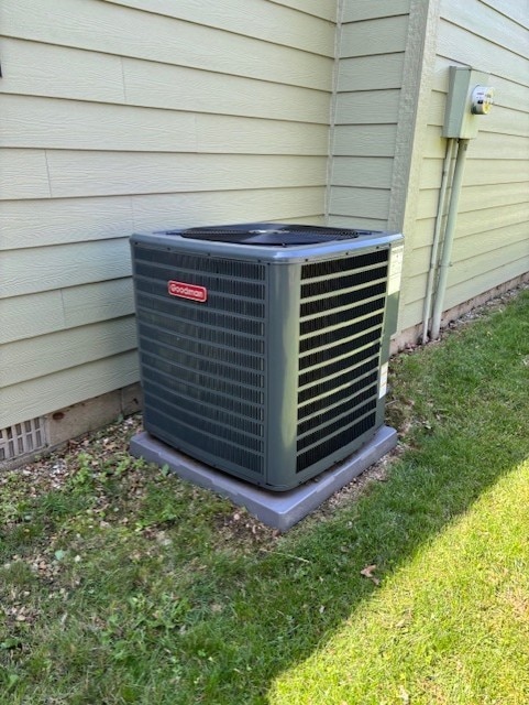 2112 Mayfair Rd, Champaign, IL 61821 - exterior view of central AC, a bar, and electric meter