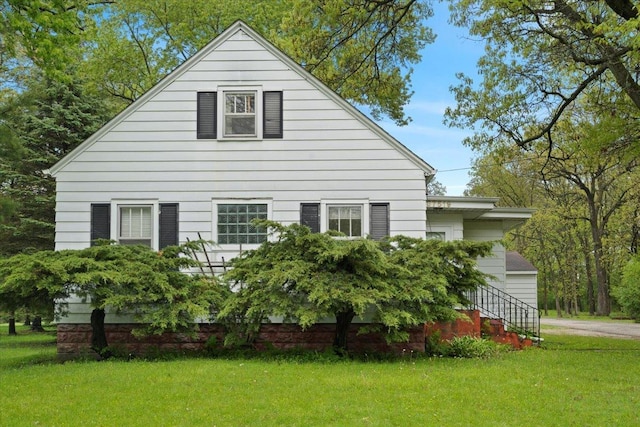 37519 N N Ave, Beach Park, IL 60087 - view of front facade with a front yard and a garage