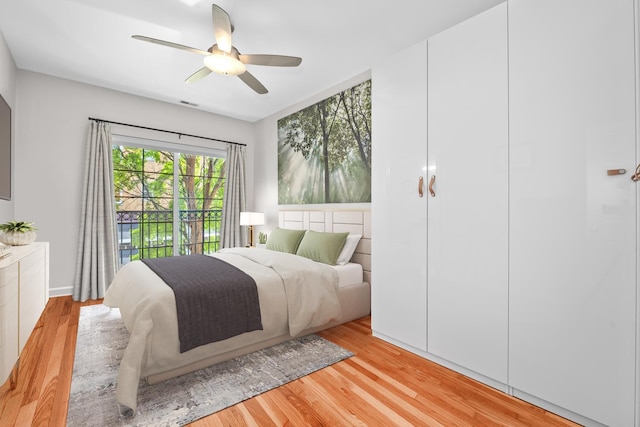 2207 N Western Ave Unit 2C, Chicago, IL 60647 - bedroom with light wood-style floors, ceiling fan, and access to exterior