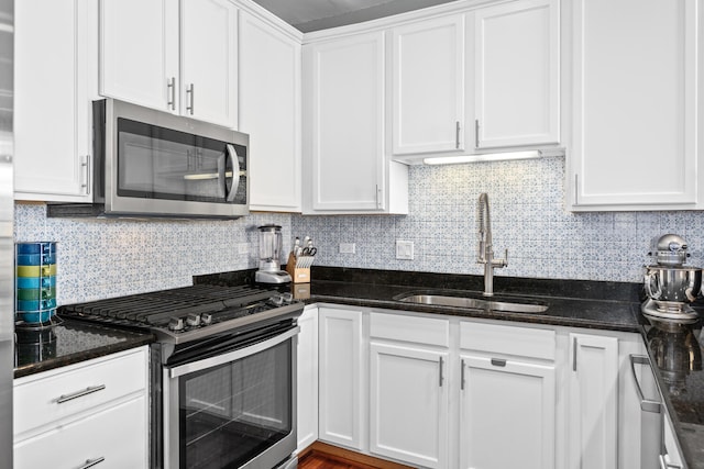 2207 N Western Ave Unit 2C, Chicago, IL 60647 - kitchen featuring stainless steel appliances, a sink, and white cabinets