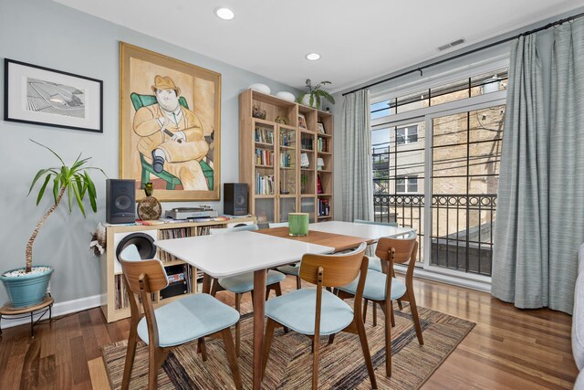 2207 N Western Ave Unit 2C, Chicago, IL 60647 - dining room featuring wood finished floors, recessed lighting, and baseboards