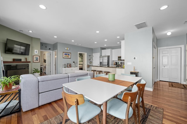 2207 N Western Ave Unit 2C, Chicago, IL 60647 - dining area featuring light wood-type flooring, recessed lighting, and baseboards