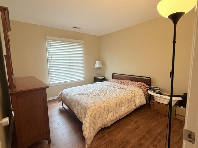 22633 Pleasant Dr Unit 11B, Richton Park, IL 60471 - bedroom featuring dark wood-style floors