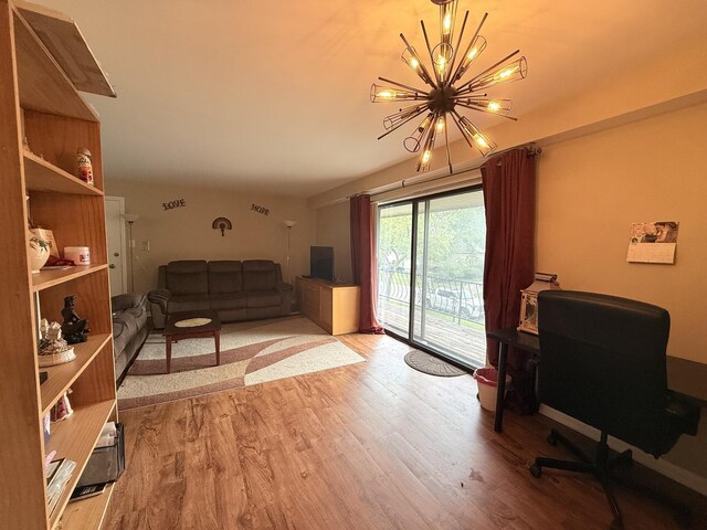 22633 Pleasant Dr Unit 11B, Richton Park, IL 60471 - living room featuring a chandelier, wood finished floors, and an office area