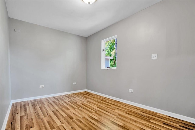 2425 W Riverside Dr, Mchenry, IL 60050 - unfurnished room featuring light wood-type flooring and baseboards