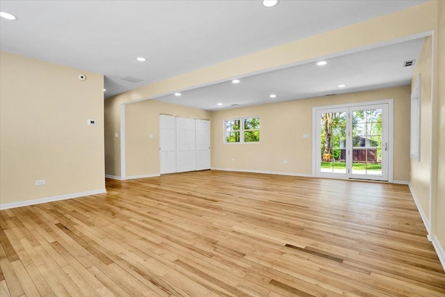 2425 W Riverside Dr, Mchenry, IL 60050 - unfurnished room featuring light wood finished floors, baseboards, and recessed lighting