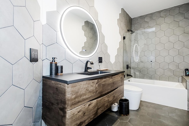 1620 Devonshire Ln, Lake Forest, IL 60045 - bathroom featuring vanity, toilet, shower / bathtub combination, tile patterned floors, and tile walls